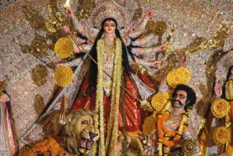 Goddess durga killing demon at Durgotsav Navratri Navaratri Bengal club, Shivaji park, Dadar,