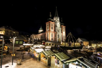 Christmas market in front of the basilica of Mariazell, night shot, main square, Mariazell, Upper