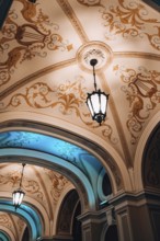 Low angle view of chandelier National Odessa National Academic Opera and Ballet Theatre at night.