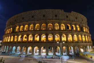 Colosseum at night, an oval amphitheatre and the most popular tourist attraction in Rome, Italy