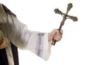 A Catholic priest with a cross during a church service Austria