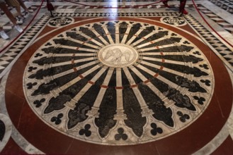 SIENA, ITALY, SEPTEMBER 23, 2023, Unique marble inlays on the floor of the Siena cathedral in Italy