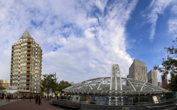 Skyscraper pencil tower and modern metal construction of Rotterdam Blaak metro station, Rotterdam,