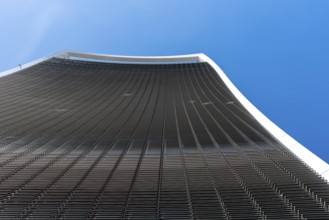 London, UK, May 14, 2019: Low angle view of 20 Fenchurch skyscraper in London agaisnt blue sky.
