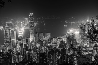Victoria Harbour skyline by night from Lugard Road Lookout at Victoria Peak, the highest mountain