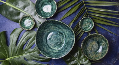 Food, Background with empty green plates over tropical palm tree leaves and monstera