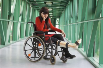 Young woman with plaster leg, Austria