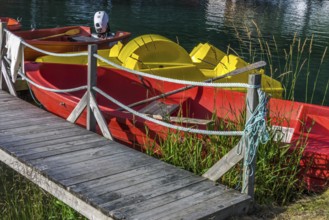 Colourful boats on a lake in Norway