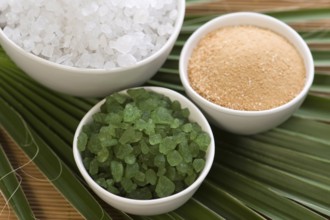 Bath salt and palm leaf