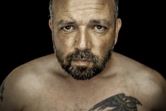 An image of a handsome man with a beard
