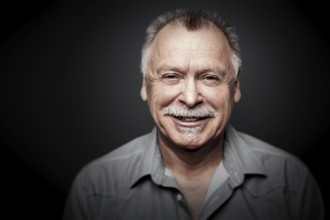 An image of a man with a mustache