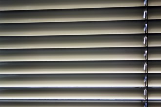 Blinds are fitted to a window to protect against heat and sun. Austria
