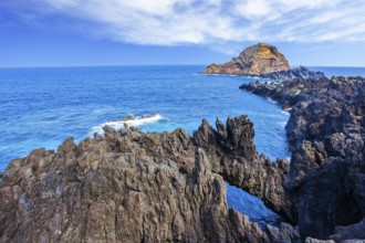 Volcanic island of Madeira. Fantastically beautiful coast. Rocks and grottoes of the Atlantic coast