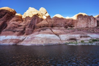 The Colorado River and Antelope Canyon. Grandiose cliffs - red sandstone outcroppings. Tour on a