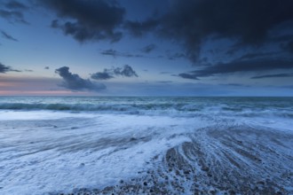 Ocean waves in dusk, Normandy, France