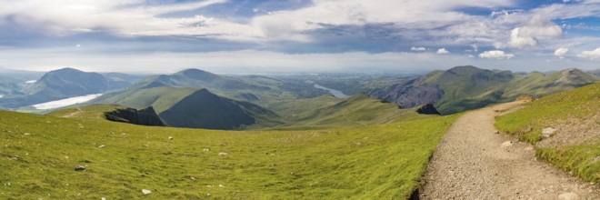 Walking down from Mount Snowdon on the Llanberis Path, Snowdonia, Gwynedd, Wales, UK, looking north