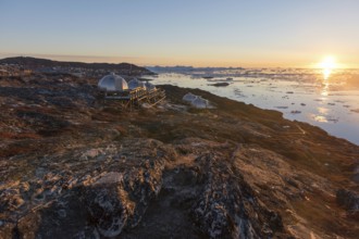 Hotel Arctic in Ilulissat with igloo rooms at sunset, Ilulissat, Greenland