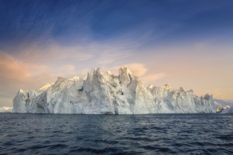 Floating glaciers in the rays of the setting sun during a polar night