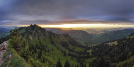Panoramic view of a light and weather scene over the foothills of the Alps, taken from the