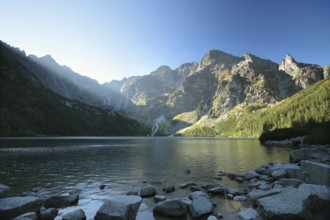 High peaks of the Tatra Mountains on the edge of the lake, Poland