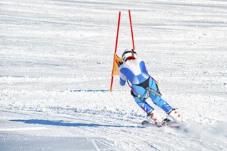 Skier on a slope in the italian alps