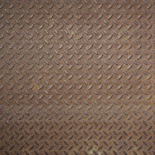 Front view of a rusty panel with non-slip surface