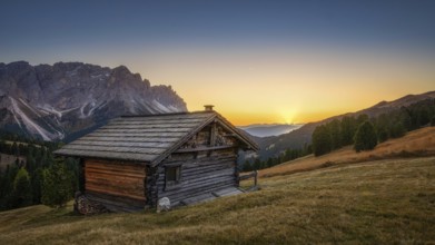 Passo Erbe under the mountain Peitlerkofel, or Sass de Putia in the light of the setting sun with