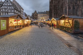 Famous Christmas market on the cathedral square in Strasbourg in Alsace. Health precautions and