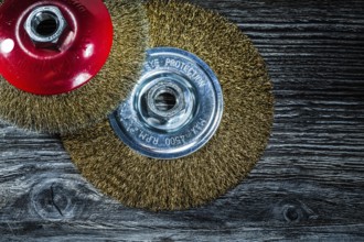 Wire wheel brushes on vintage wooden board
