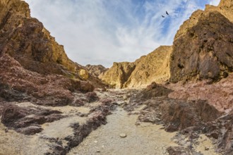 Israel in January. Multicolor and picturesque Black canyon in ancient mountains of Eilat