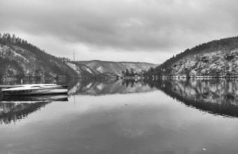 Single track railway bridge over the Vltava river, Czech Republic . Winter landscape
