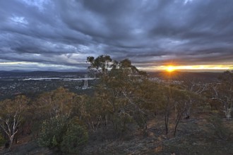 Canberra at night from Mount Ainslie Lookout and with the setting sun