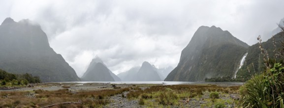 Magnificent panoramic view of Milford Sound during rainy weather, South Island of New Zealand