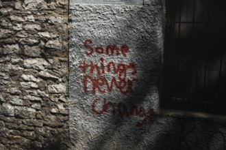 Writing on the wall of the building in Gjirokaster, Albania