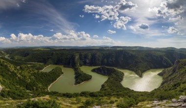 Panorama of meanders at rocky river Uvac gorge on sunny day, southwest Serbia