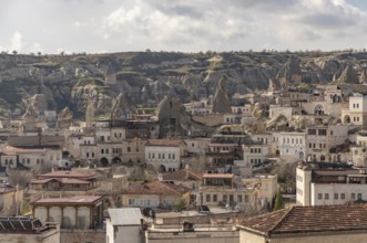 A picture of the town of Goreme and the landscape of the Goreme Historical National Park, in