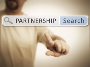 An image of a man who is searching the web after partnership