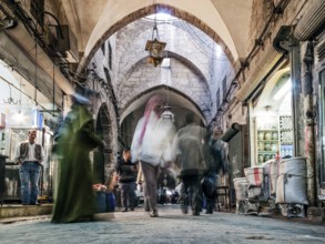 Busy souk market shopping street in old town of aleppo syria