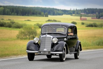 VAULAMMI, FINLAND, AUGUST 4, 2018: Classic black Mercedes-Benz car, probably mid-1930s 170V, on