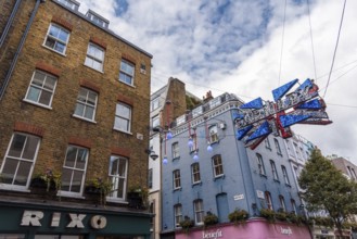 LONDON, UK, August 27, 2019: View of Carnaby Street. It is a pedestrianised shopping street in Soho