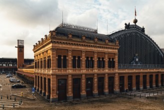 Madrid, Spain, October 27, 2018: Exterior view of old Atocha Railway Station at sunrise
