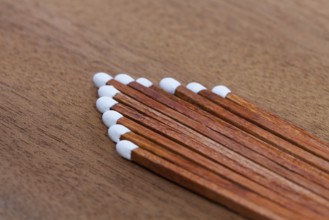 Detail of luxury matches on the wooden desk