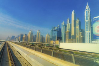 UAE Dubai skyline visible from the Dubai Metro. Shooting Location: Dubai