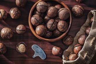 Macadamia Nuts On Vintage Wood Close up
