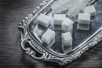 Sugar cubes sticks on tray
