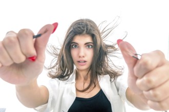 Girl having Electric Shock, electricity problems, Girl holds bare wires