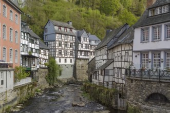 Picturesque houses along the Rur River in the historic center of Monschau, Germany