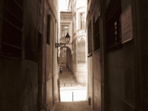 Narrow street in the city center of Barcelona, Barcelona, Spain