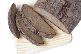 Cut bread on wooden board