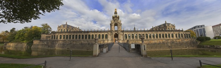 Dresden Zwinger palace panorama with channel and park, Germany
